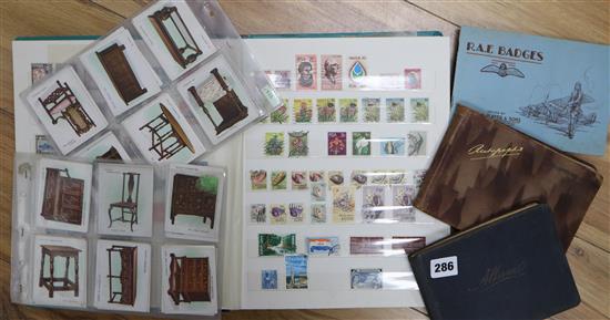 A stamp album, two autograph books and cigarette cards
